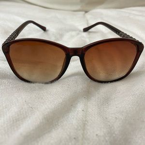 Dark Havana cat eye sunglasses. Chanel on lens. The side of the lens #is faded.